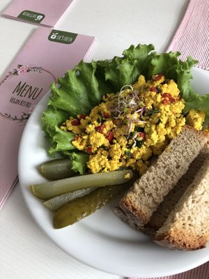 Tofu scramble with green onion, turmeric, Himalayan salt, kapia peppers at She's Green Boutique & Atelier in Sibiu