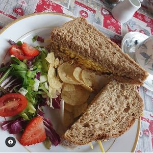 Cheese & onion pickle sandwiches with crisps and salad. Pot of tea too - £5. at Chocolate Orange Tearooms in Worksop