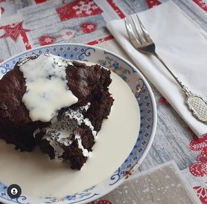 Chocolate, cherry & almond brownie with Elmlea cream. at Chocolate Orange Tearooms in Worksop