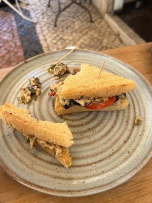 GF Tuna sandwich ( half eaten)  at Goldig in Lagos