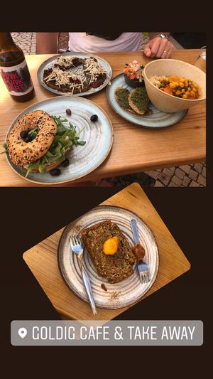 Bagel with vegan cream cheese, vegan toast, daily special (Moroccan curry), and banana bread.  at Goldig in Lagos