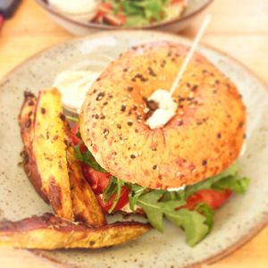 Bagel special of the day with beetroot burger, sweet potato and homemade hummus  at Goldig in Lagos
