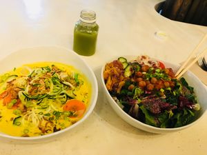 Golden Laksa and Med macro bowl.  at Kokomo in Vancouver