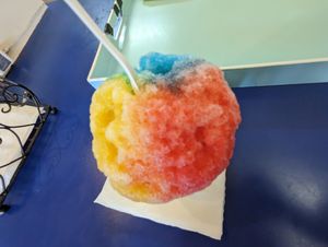 Shave ice: mango, blue raspberry and li hing mui syrups at Surfing Monkey Shave Ice in Kihei