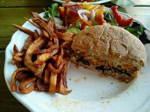 burger meal with sweet potato fries and salad at Eat of Eden in South West London
