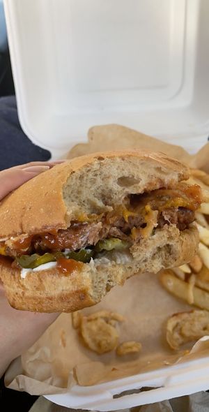 Camp fire burger comes with fries at The Buzz Mill in San Marcos