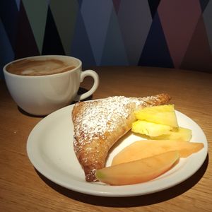 Apple turnover plus fresh fruit from the food boat at Tibits in South East London