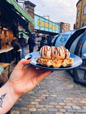 Vegan Belgian waffle topped with vegan ice cream and chocolate sauce  at Vburger Camden in North West London