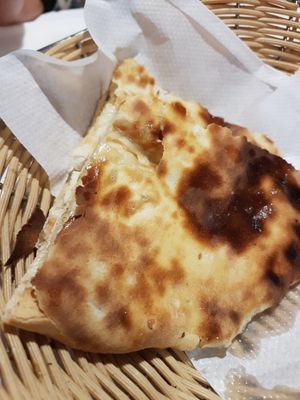 Naan with vegan cheese and mushrooms at Sanskar Nepal in Lisbon