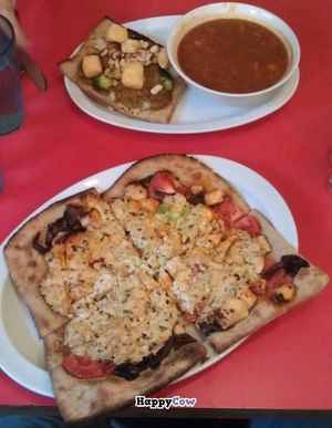 bottom: Buffalo Tofu pizza with their house-made basil tofu mash and Daiya cheeze; top: Peanut Curry pizza and a delicious soup at Veggie Planet in Cambridge