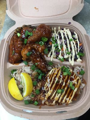 Rice and peas, spicy cauliflower, red cabbage salad at Dajen Eats in Eatonville