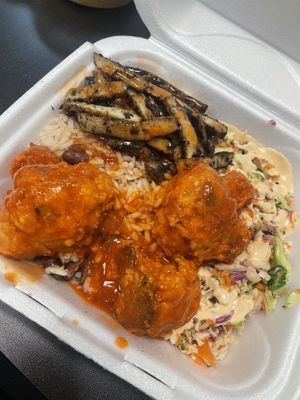 Jerk chickn & buffalo cauliflower bowl   at Dajen Eats in Eatonville