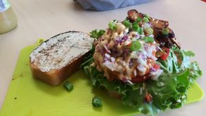 Jerk and buffalo chicken sandwich at Dajen Eats in Eatonville