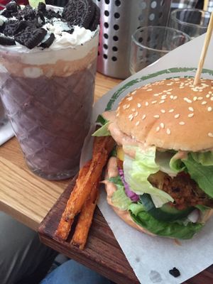 Milkshake and Anna-Karin with sweet potato fries. at Göteburgare Vegan in Gothenburg