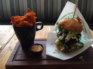 Anna Karin with sweetpotato fries.  at Göteburgare Vegan in Gothenburg