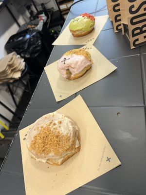 Cinnamon scroll, pistachio rose, matcha strawberry  at Crosstown Doughnuts - Shoreditch in East London