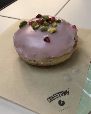 Orange blossom with pistachio and pomegranate  at Crosstown Doughnuts - Shoreditch in East London