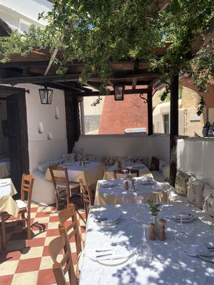 Outdoor seating  at Candouni in Santorini