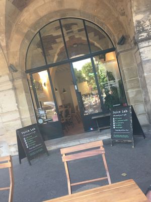 Outside of juice bar, beautiful location.  Inside and outside seating available. at Mandarine in Paris
