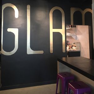 lots of black with gold accents! at GLAM Vegan in Miami