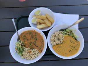 Peanut stew (left), pumpkin seed stew (right), and cassava fries. SO GOOD. at Veg on the Edge in Santa Cruz