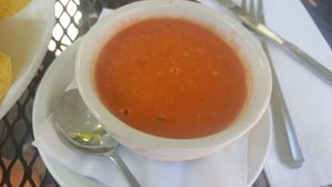 Vegan tomato basil soup with coconut milk base at Local Flavor Cafe in Eureka Springs