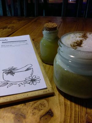 wheatgrass shot + Matcha oat latte  at Dwell in Bergen