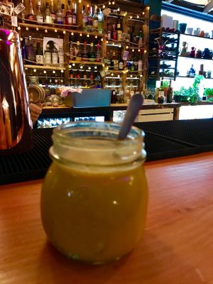 Golden latte and bar area at Dwell in Bergen