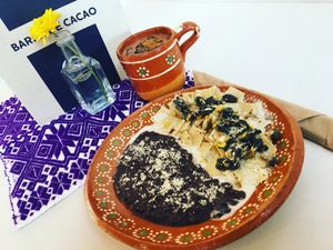 Amaranth and Cacao Beverage & Traditional Chilaquiles Ying Yang with cashew cream sauce and Huitlacoche mushrooms Topping.  at Casa Cacau in Ajijic