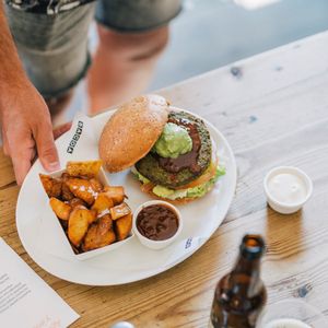 The Gran Vegano burger: Our crispy chickpea spinach patty, tomato chutney and whipped avocado. Without mayo.
 at Bacoa - Universitat in Barcelona