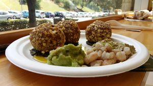 Fake meat ball of soya beans and hazelnut, guacamole, cream of zucchini and hazelnut  at FrescoBaldo in Rome