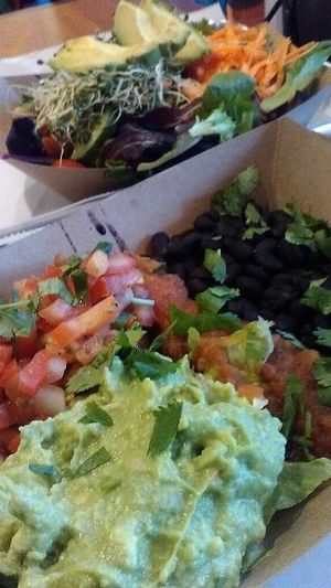 vegan burrito bowl with extra beans instead of rice; small salad in background at Bubby's Take Away Kitchen in Red Hook