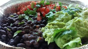 Covid-19 era vegan burrito bowl ordered with "no rice." Vegan burrito and burrito bowl may not appear on menu board. at Bubby's Take Away Kitchen in Red Hook