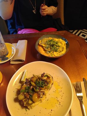 the hummus toast and ravioli as vegan versions. both approximately 9€. at Holy Donut - Vokiečių in Vilnius