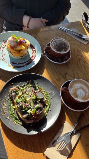 Vegan pancake and mushroom toast. Btw the sweet chai latte has dairy in it,  the spicy one doesnt.  at Addington Coffee Co-op in Christchurch