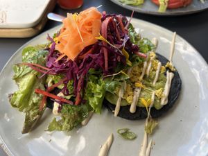 Pancake with salad on top   at Alive in Geneva