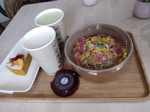 Pad thai salad, lattes and carrot cake at Alive in Geneva