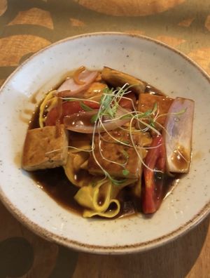 Tofu saltado con fetuccini a la huancaina  at Veda Restaurante in Miraflores