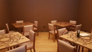 Comfortable indoor seating (one of several rooms of seating) at Veda Restaurante in Miraflores