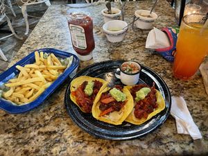 Tacos Al pastor, with side of fries (I didn’t need the fries)  at Casa Tequila in Cancun