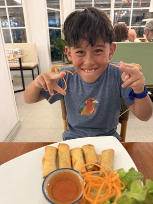 Jerry enjoying some spring rolls!   at Hua Hin Vegan Cafe and Wine in Hua Hin
