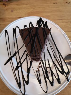 Lovely vegan chocolate cake (one little bit already eaten by me) at Hua Hin Vegan Cafe and Wine in Hua Hin