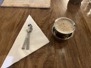 Filter coffee with oat milk   at Justbe by Nidhi Nahata in Bangalore