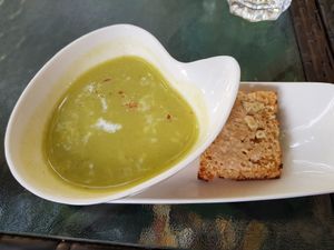 almond broccoli soup with garlic bread at Justbe by Nidhi Nahata in Bangalore
