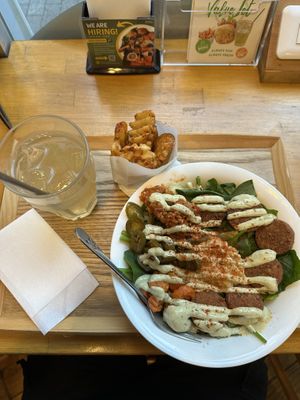 Spinach based falafel bowl with mesh potatoes and a lemonade.  at Falafel Brothers - Minato in Tokyo