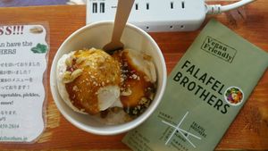 Vegan ice cream (¥600+tax): made with coconut milk and topped with almonds and date syrup. Amazing, amazing, and with two big scoops. at Falafel Brothers - Minato in Tokyo