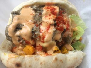 Full falafel sandwich with pumpkin, guacamole, “brother” gamoush, and chili sauce. Sooo good! at Falafel Brothers - Minato in Tokyo