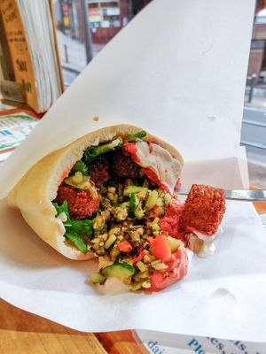 So much filling that it's fallen out at Falafel Brothers - Minato in Tokyo