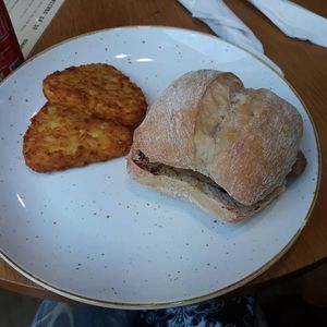 Vegan Sausage Sandwhich with Hashbrowns. at Camber Coffee in Newcastle Upon Tyne
