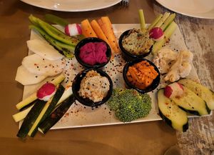 Hummus board with raw vegetables at Chef Momo in Cartagena